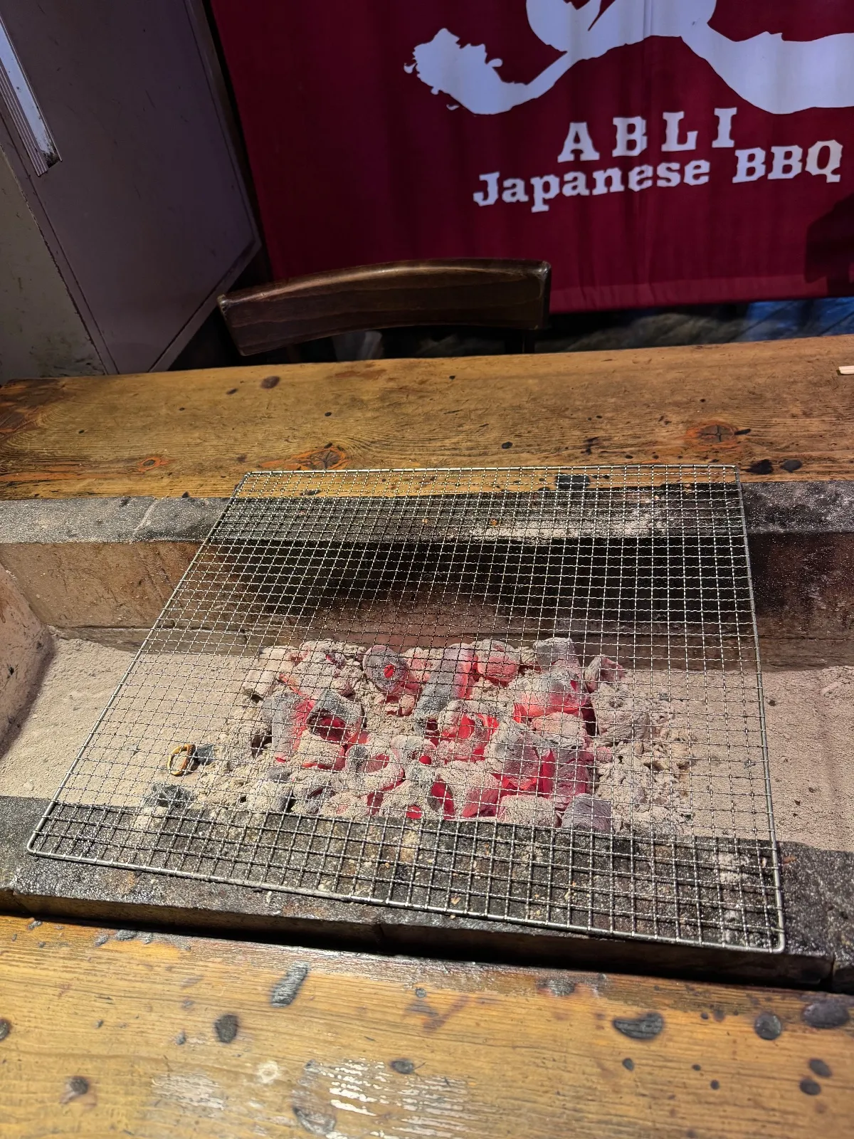 Hot coals at the tables…it’s getting sweaty in here!