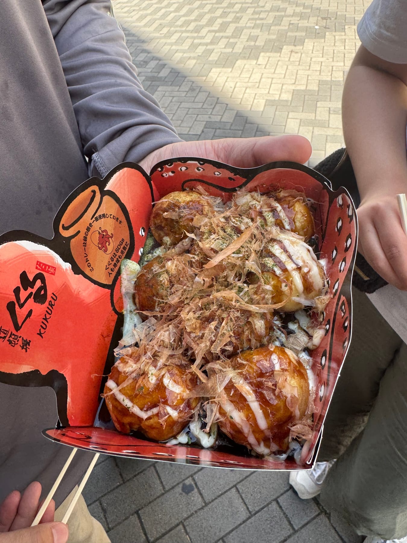 Takoyaki are savory fritters with pieces of octopus (aka, octopus balls). This might not seem appealing, but they are ac