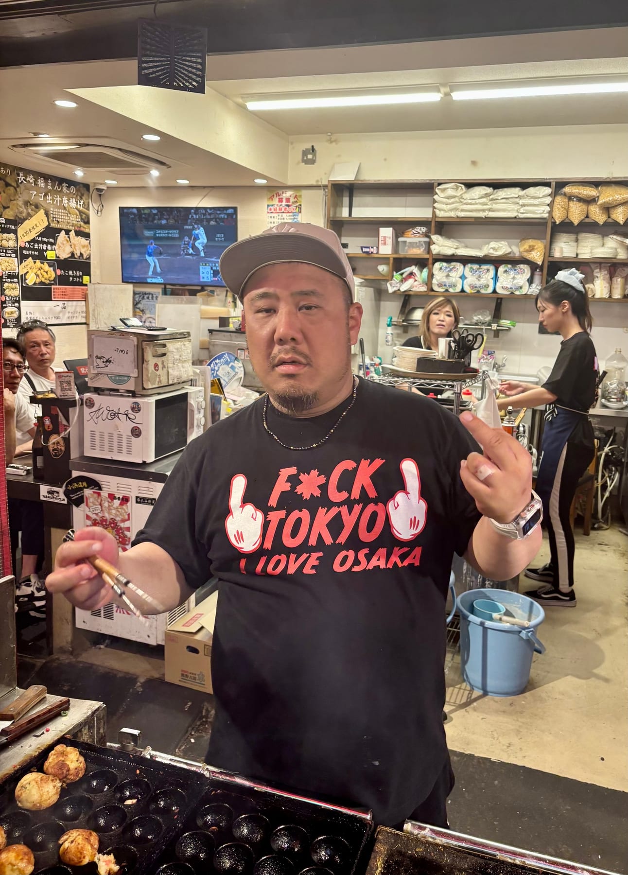Another angry chef! I’m sensing a little friendly rivalry with big sister Tokyo. Note the takoyaki pan in the lower port