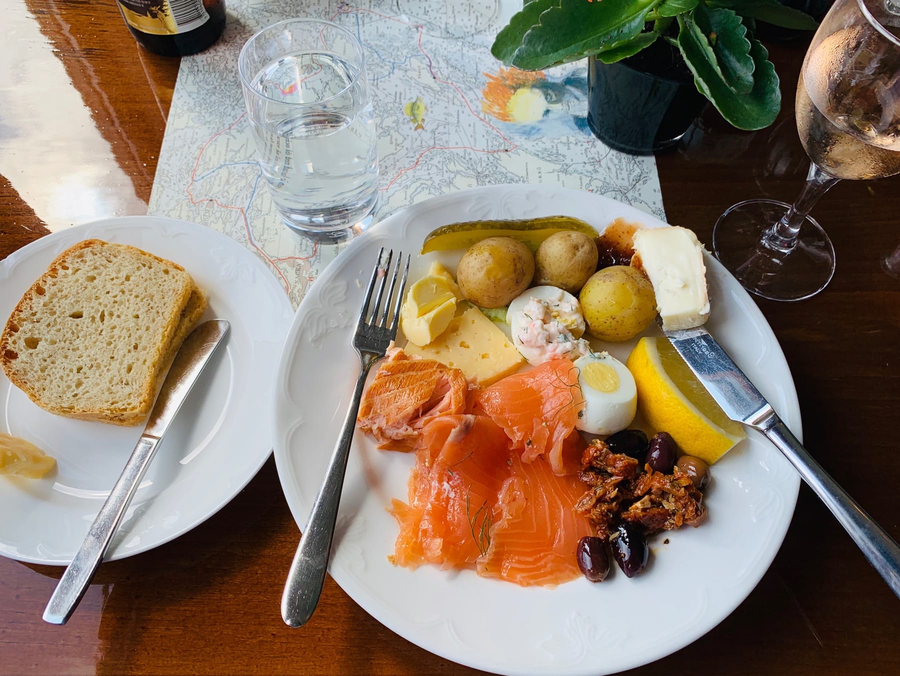I had cured salmon, cold baked salmon, Swedish deviled egg with mini shrimps, cheese, bread, and potatoes. Someone told