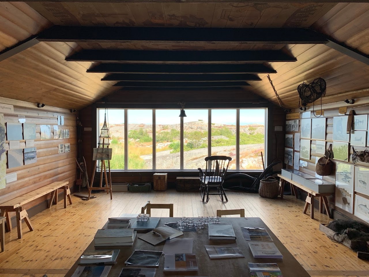 The inside of the home, with the windows looking out onto the water. Fun fact: The island just got electricity 7 years a