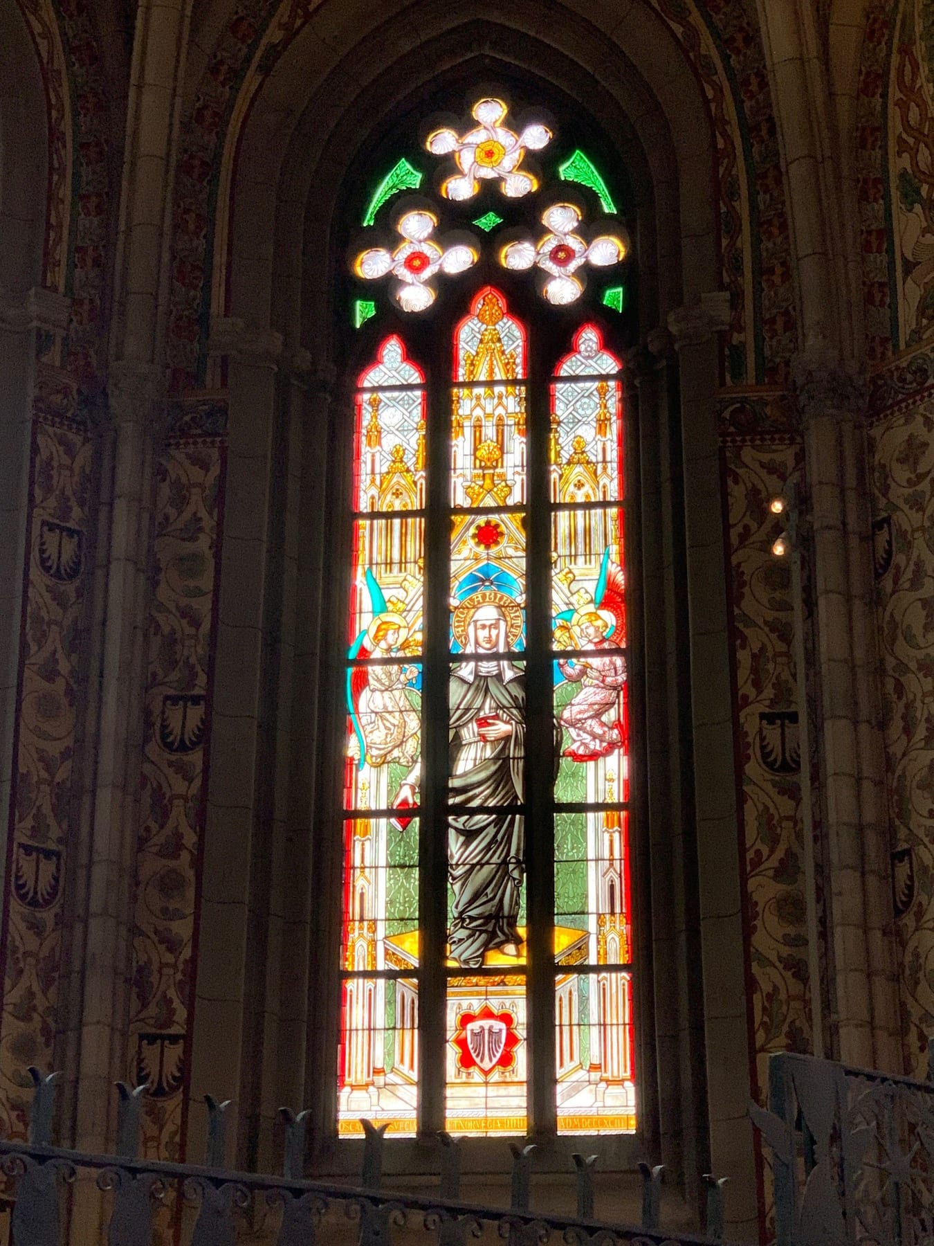 Casey told me that they built flying buttresses in order to be able to put in windows; otherwise the walls would not be
