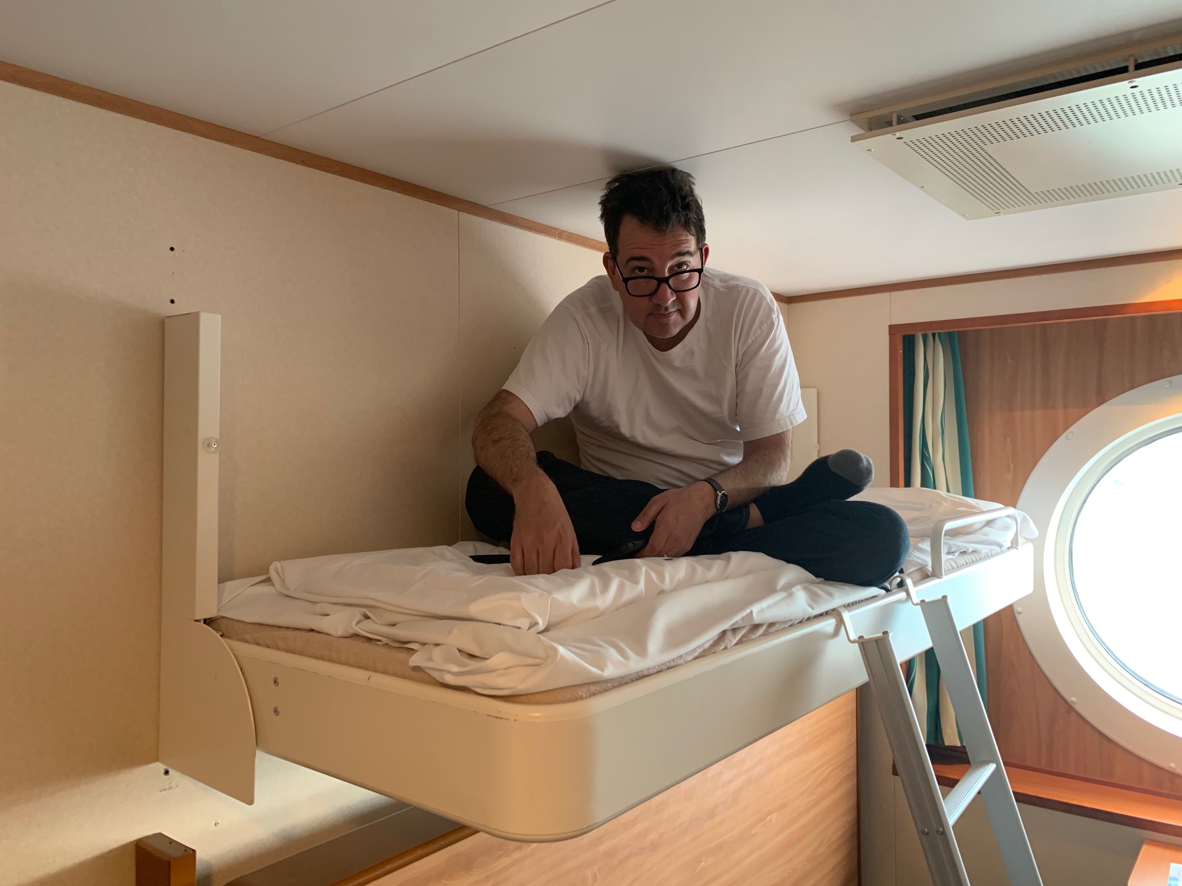 Casey doing yoga on Anna’s bunk.